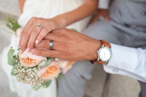 Two people's hands as they get married