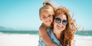 Mother and daughter on a beach