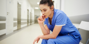 A surgeon looking stressed