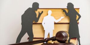 A man and a woman fight over a child in a custody battle