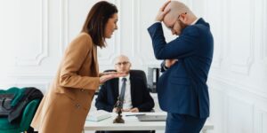 Couple fighting in an attorney's office