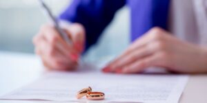 Woman signing prenup