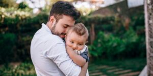 Father holding baby